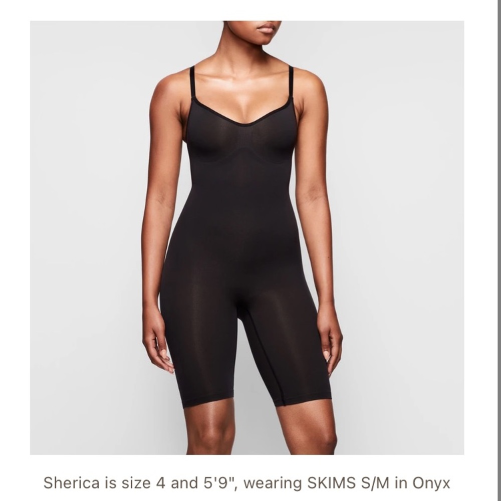 Skims sculpting body suit mid thigh